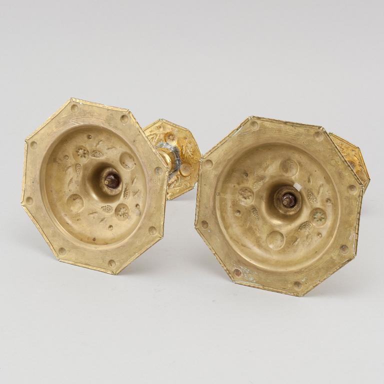 A pair of brass baroque style candlesticks, 20th century.