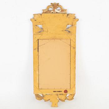 A Gustavian style mirror by John Lundmark, 20th Century.
