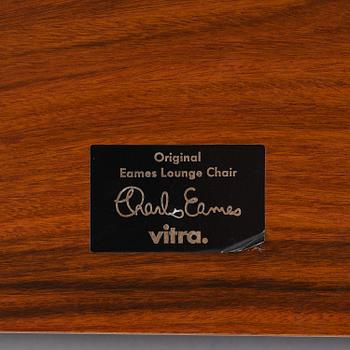 Charles & Ray Eames, an "Eames Lounge Chair" with ottoman, Vitra, 2000s.