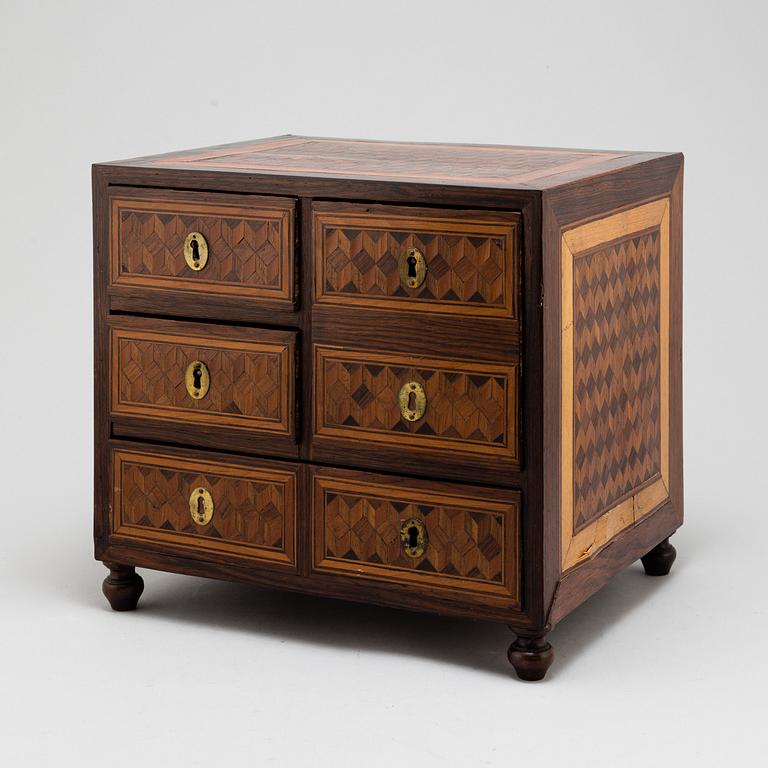 A 19th century chest of drawers.