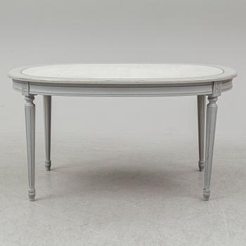 A dining table and four chairs, gustavian style, late 20th century.