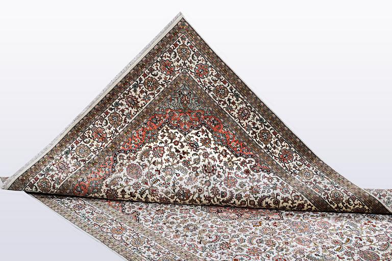 A carpet, silk Kashmir, ca 260 x 172 cm.