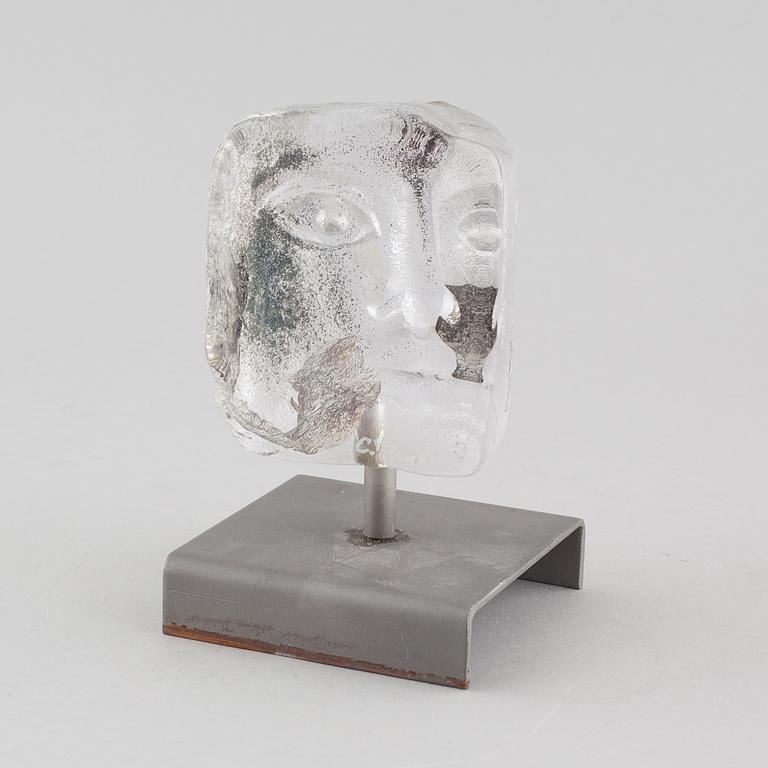 a glass object, signed.