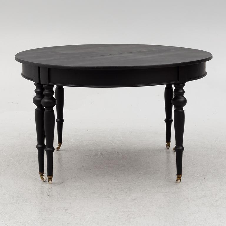A dining table, late 19th Century.