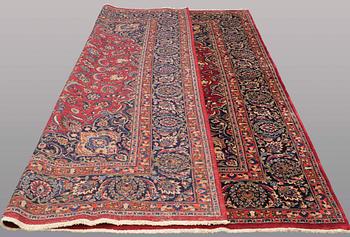 A CARPET, Mashad, signed, ca 385 x 293 cm.