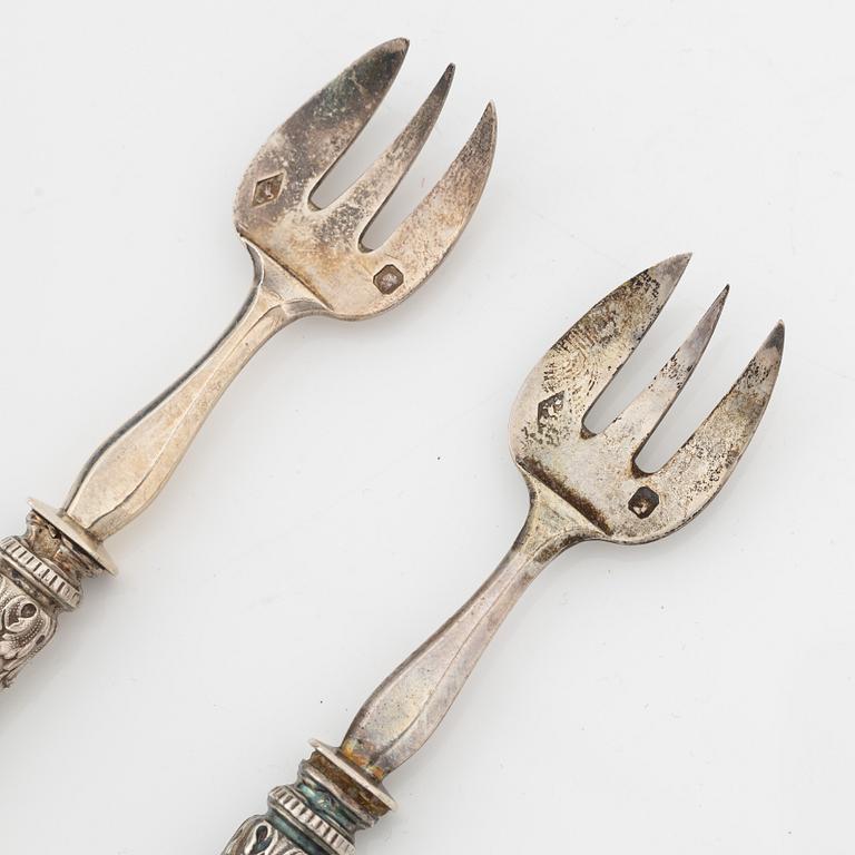 Philippe Berthier, a set of 12 silver oysterforks, mid 19th century.