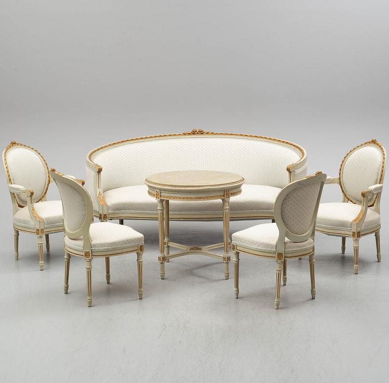 A sofa, four chairs and a table, gustavian style, early 20th century.