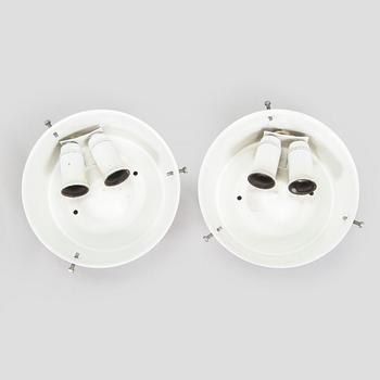 Arne Jacobsen, a pair of ceiling lamps/wall lamps, "AJ-Eklipta", Louis Poulsen, Denmark.