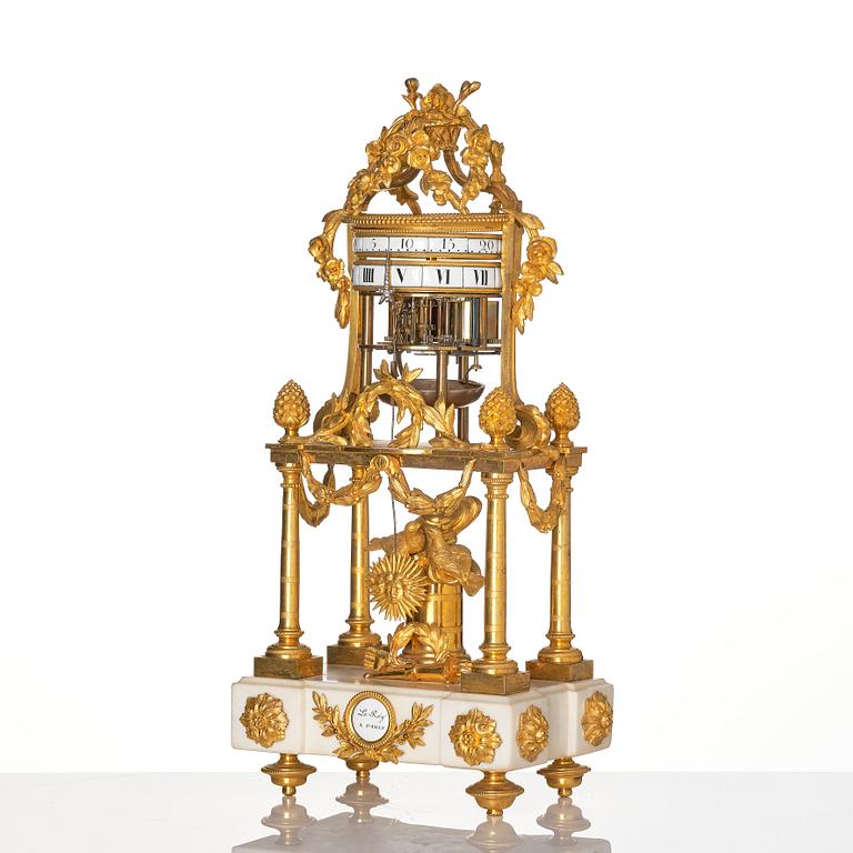 A Louis XVI marble and ormolu 'aux cercles tournants' portico mantel clock, late 18th century.