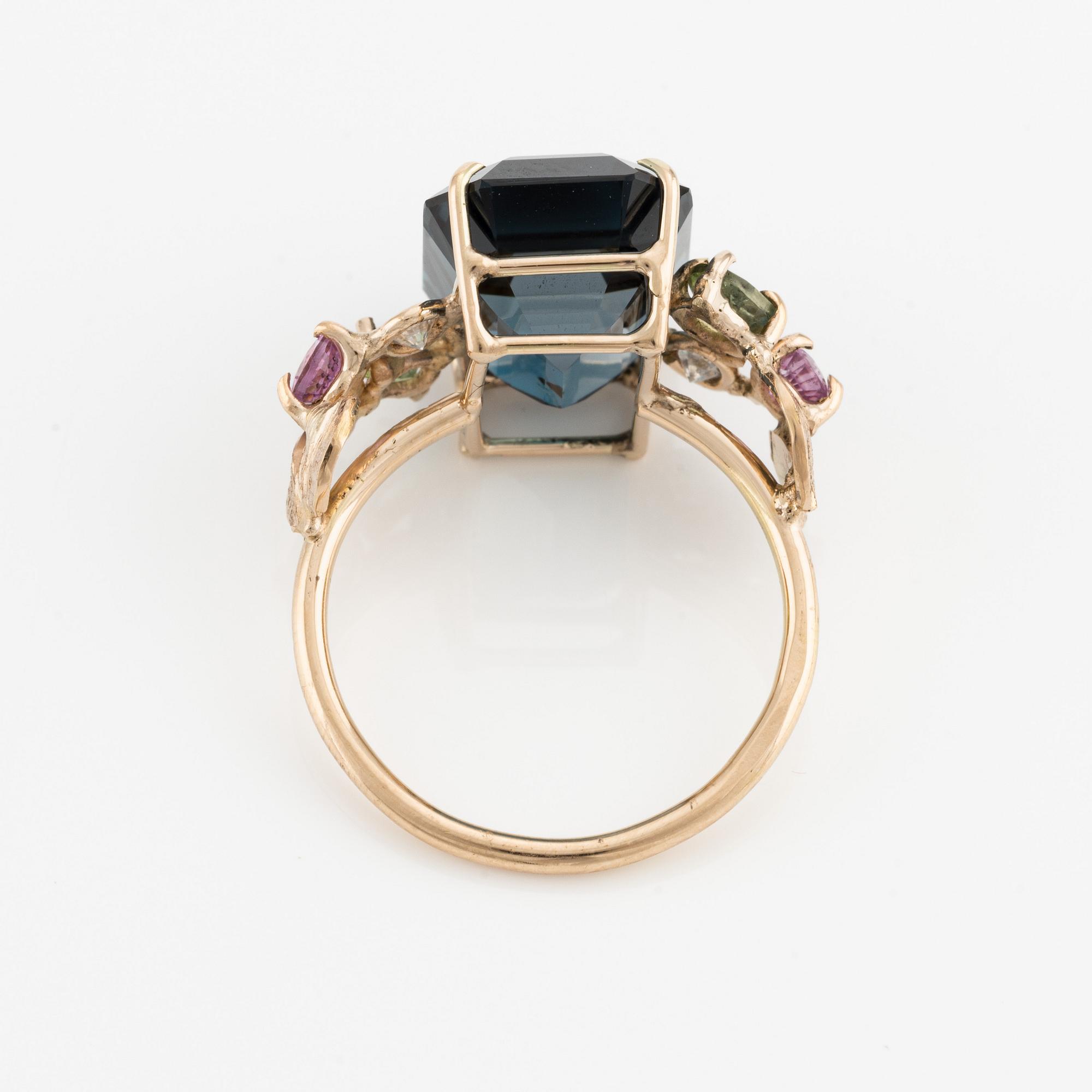 Ring, cocktail ring, with large blue topaz, pink and green tourmalines, and brilliant-cut diamonds.