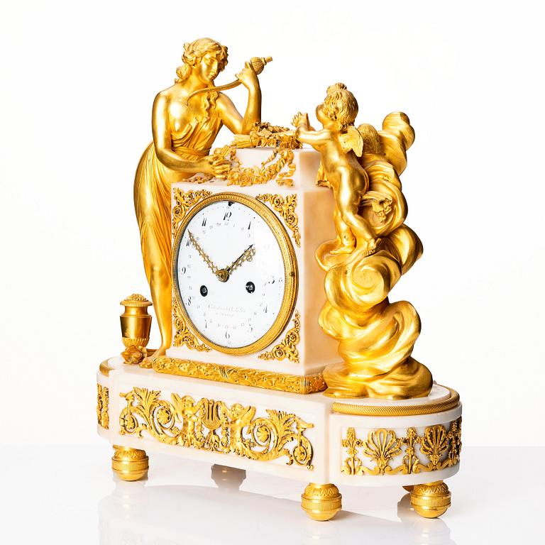 A Louis XVI marble and ormolu mantel clock, late 18th century.