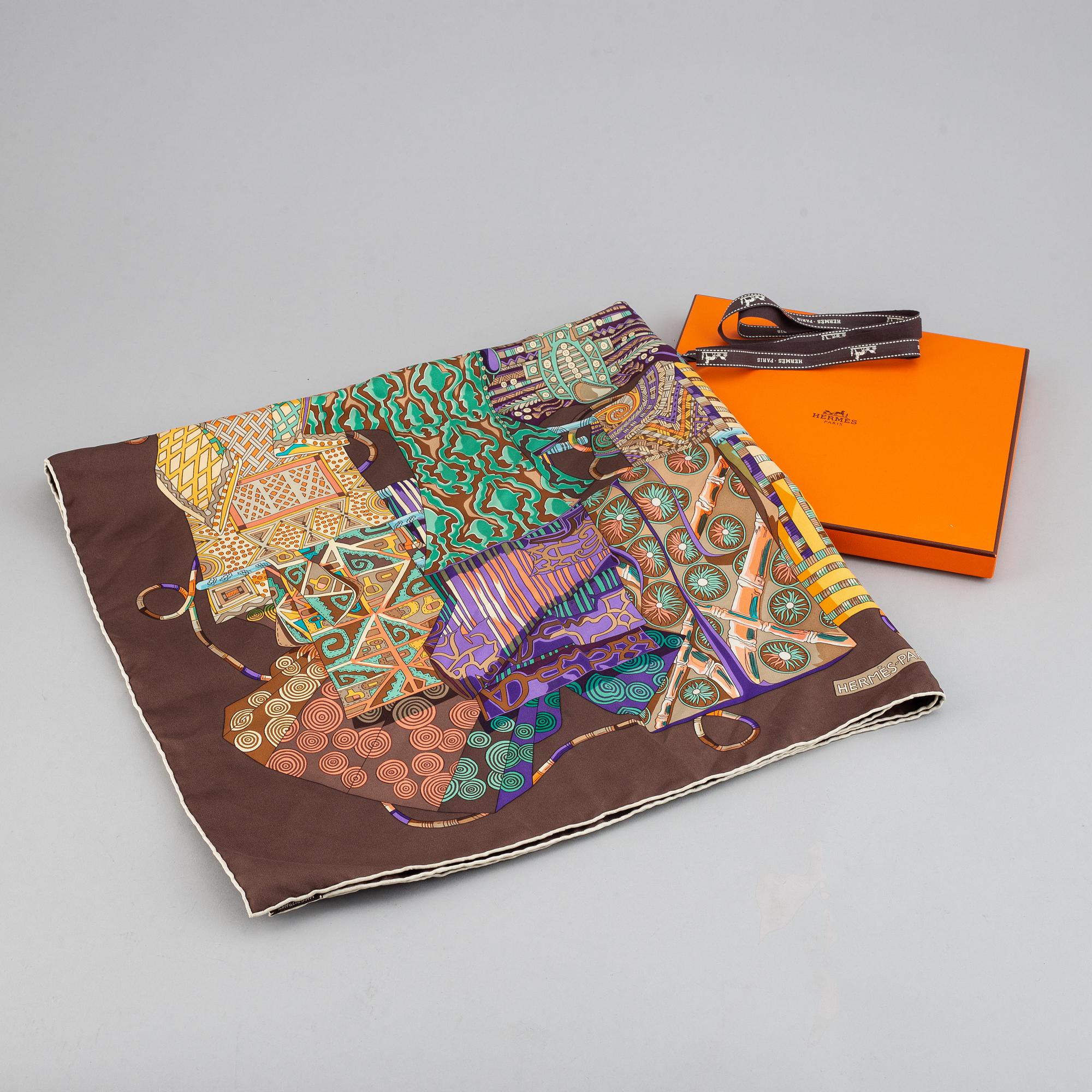 HERMÈS, a silk scarf 'Voyage en Etoffes'.