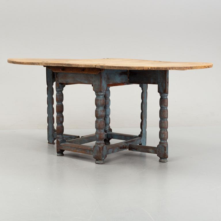 A 19th Century painted gate leg table.
