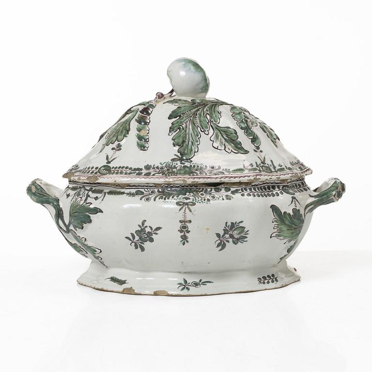 A faience lidded turrine, France, 18th/19th century.