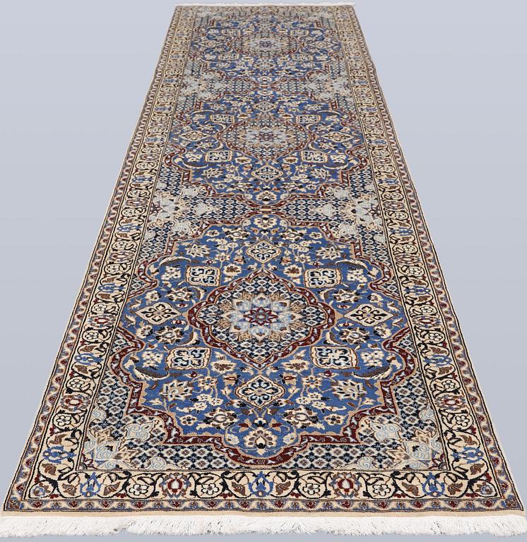 A carpet,  Nain, part silk, so-called 9 LAA, approx. 382 x 99 cm.