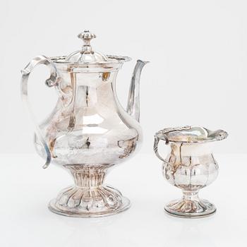 A 1950s footed bowl and a three-piece silver coffee set from the latter half of the 20th century.