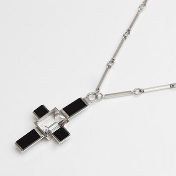 Wiwen Nilsson, a crucifix pendant and chain, sterling silver with facet cut rock crystal and onyx, Lund, Sweden 1935.