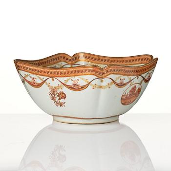 An oval vegetable tureen with cover and a pillow shaped bowl, Qing dynasty, late 18th century.