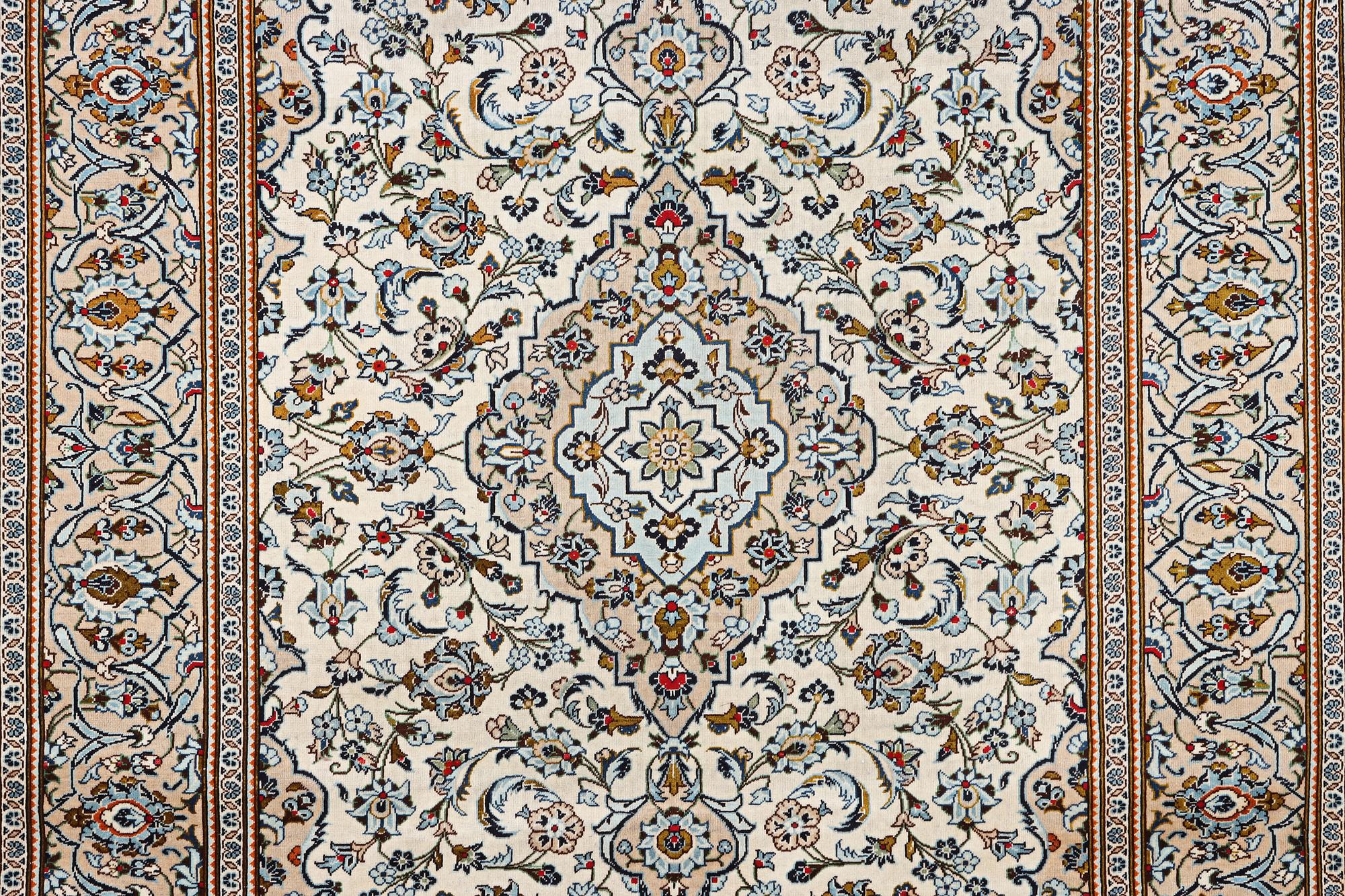 A Kashan carpet, c. 355 x 238 cm.