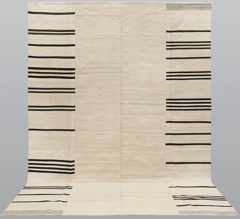 A carpet, Kilim, ca 315 x 225 cm.