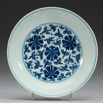 A set of four blue and white lotus dishes, Qing dyanasty with Qianlong sealmark.