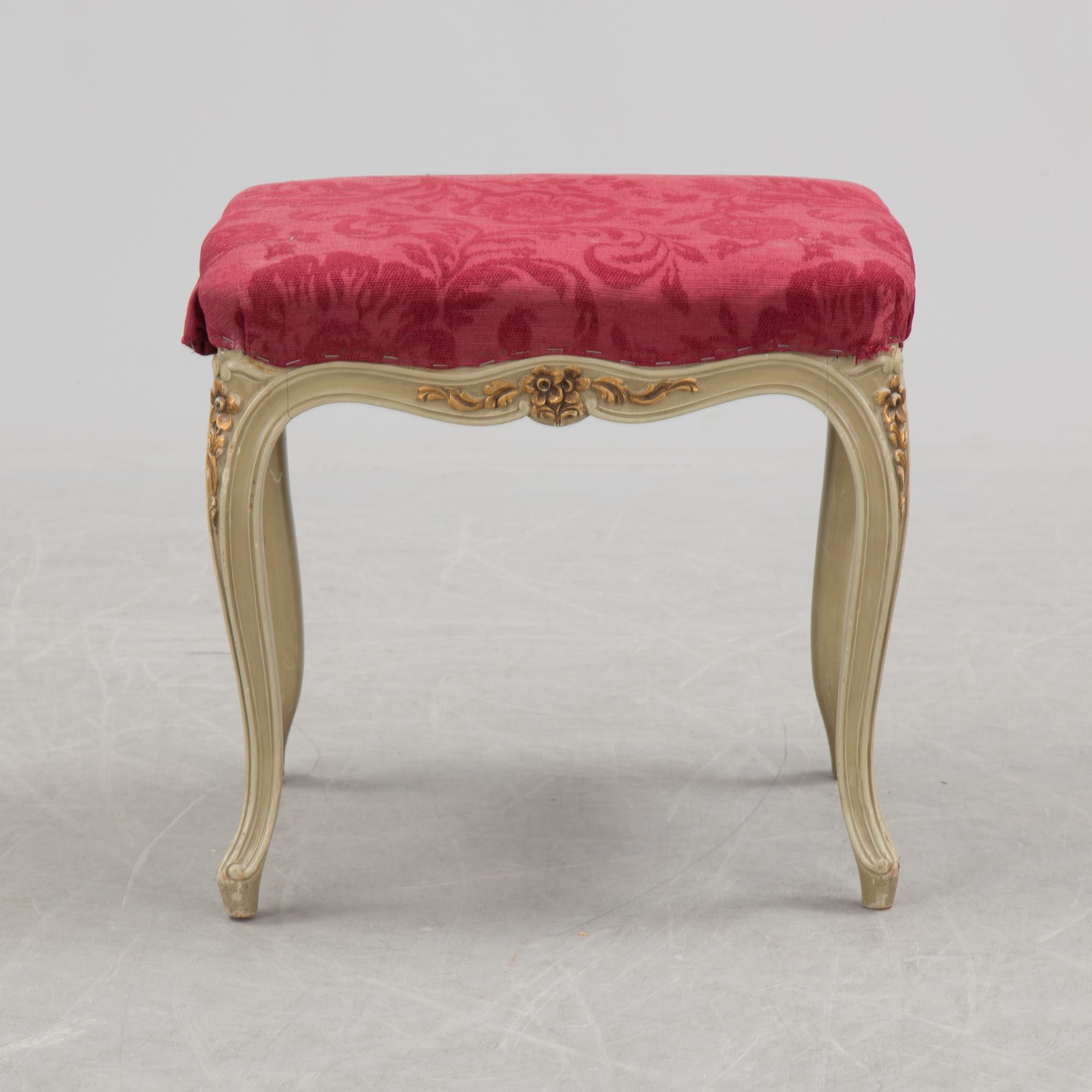 A mid 20th century Rococo style dressing table, a pair of bedside tables and one stool.