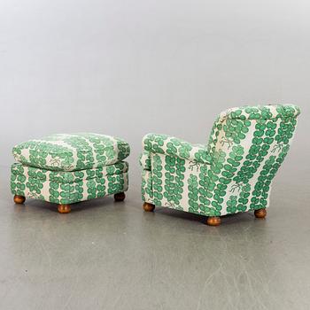 A model 336 easy chair with stool by Josef Frank for Firma Svenskt Tenn, Sweden.