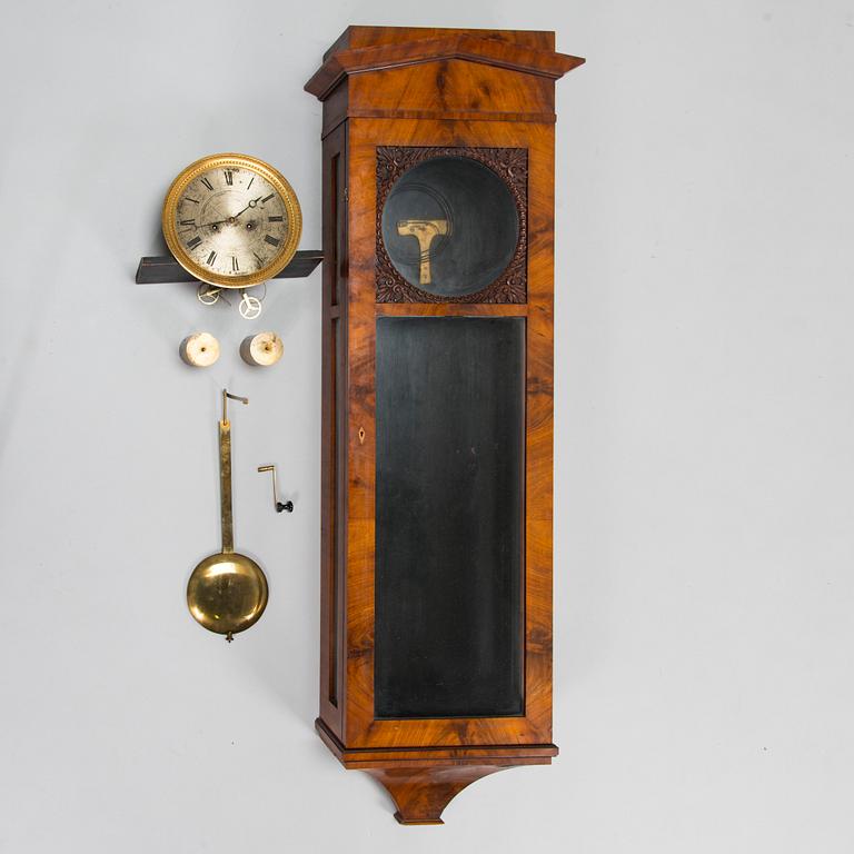 A mid 19th Century Biedermeier wall clock.