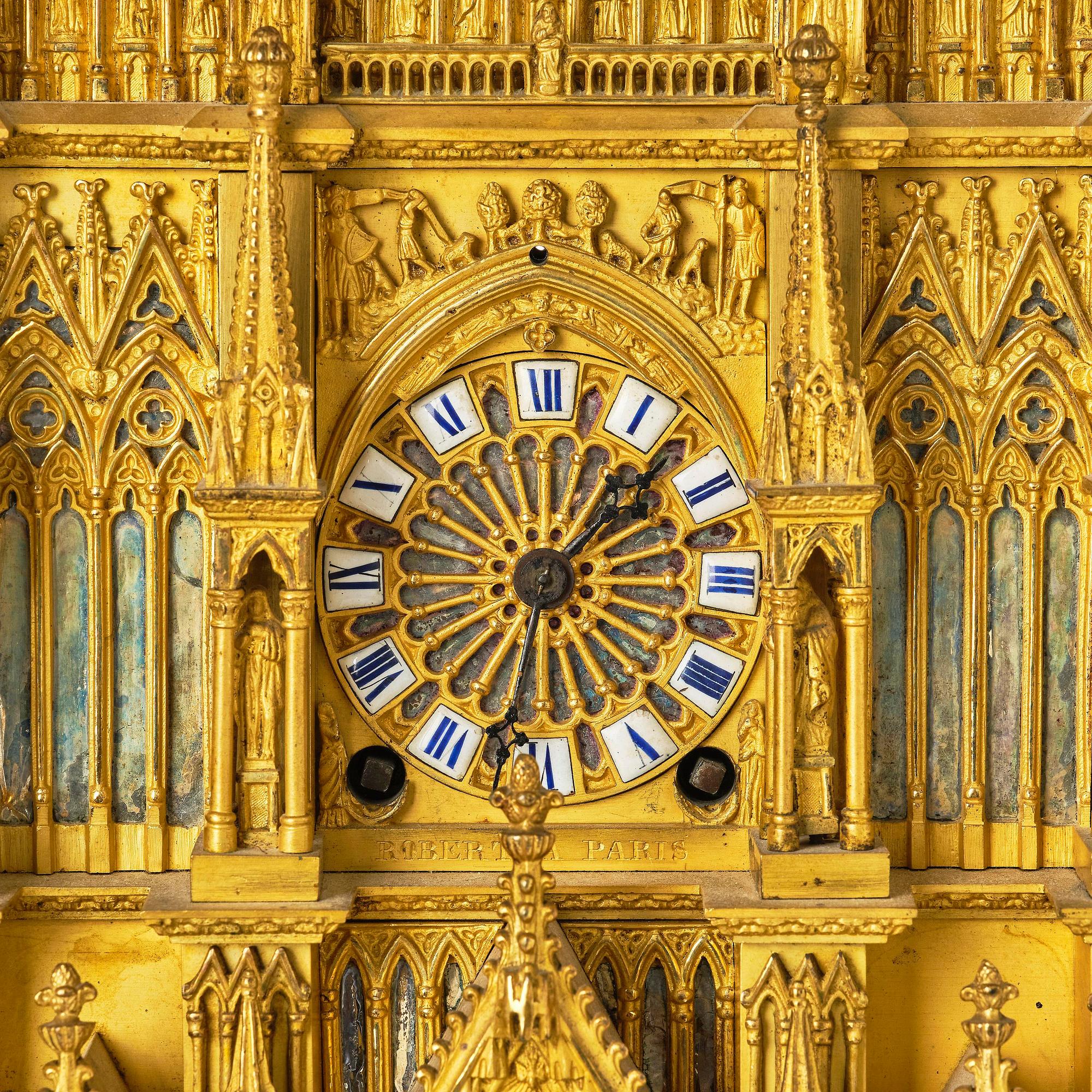 A Charles X ormolu mantel clock modelled as the Cathedral of Reims, Paris, 1820's.