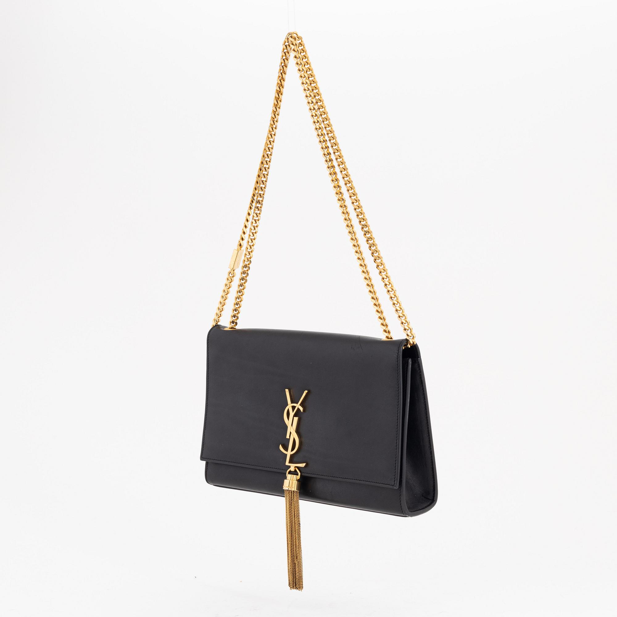 Yves Saint Laurent, a black smooth leather 'Kate' handbag.