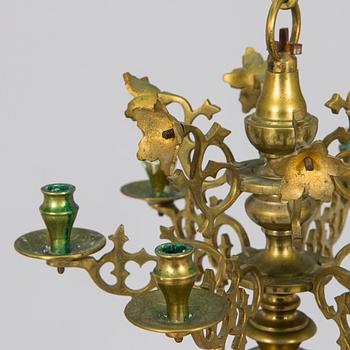 A brass candelabrum, first half of the 20th century.