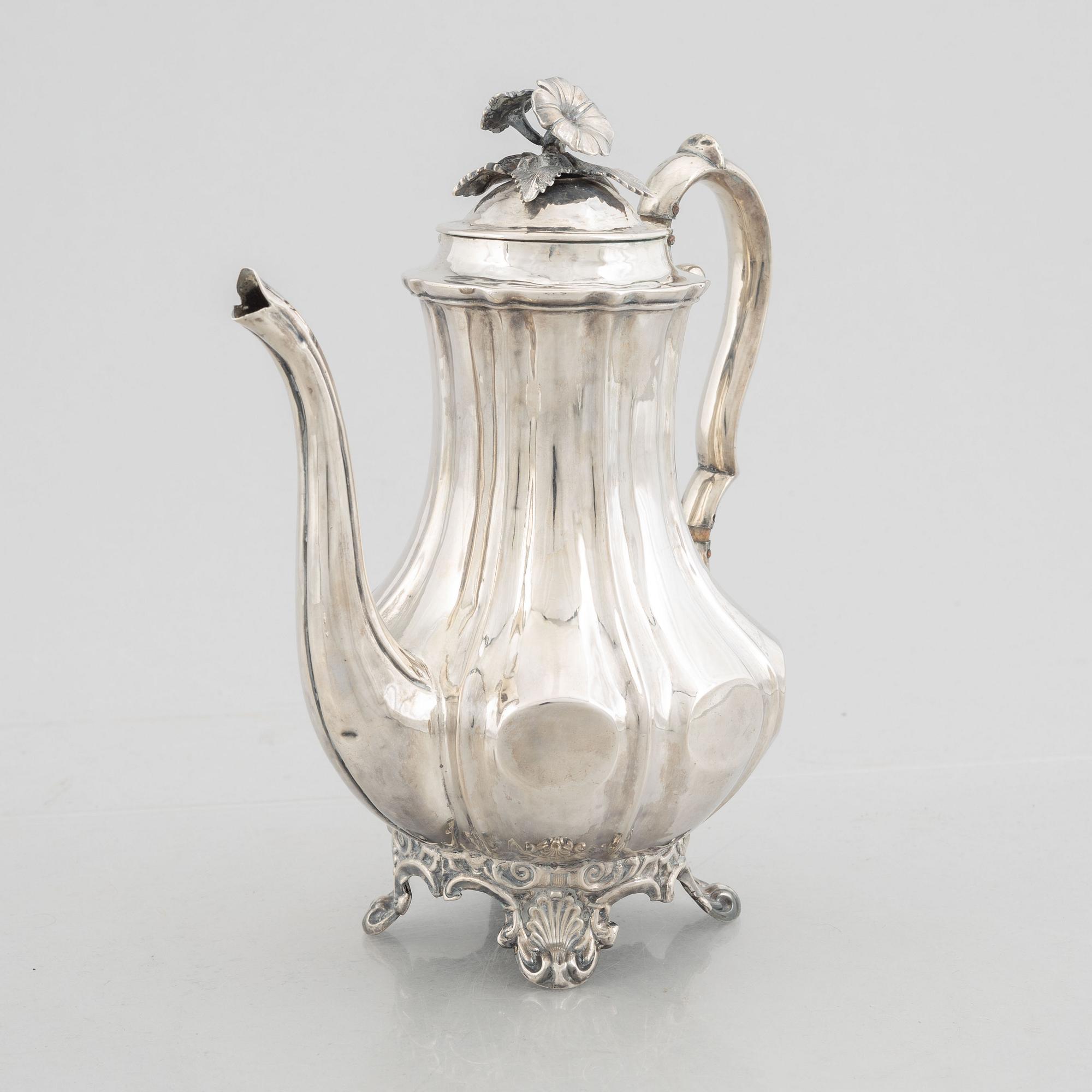 A Swedish Silver Rococo-Revival Coffee Pot, mark of Christian Hammer, Stockholm 1850.