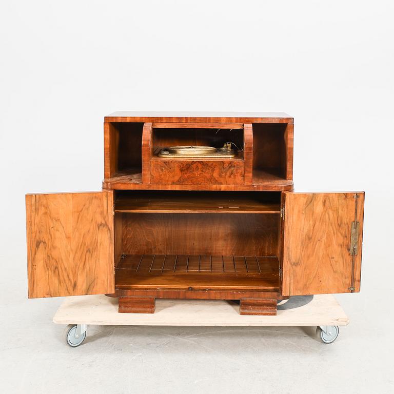 An Art Deco walnut cabinet/record player first half of the 20th century.
