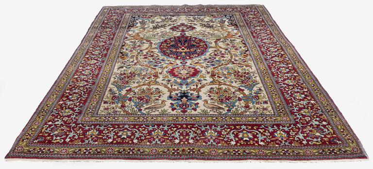 An antique Isfahan rug, Central Persia, c. 219 x 143 cm.