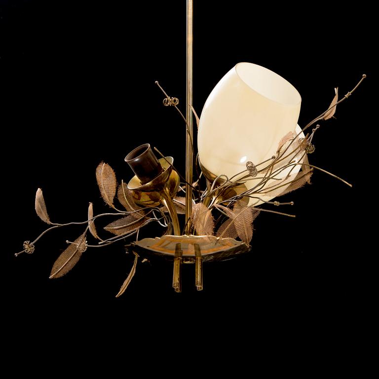 A mid 20th Century model 9029/4 chandelier for Taito Oy, Finland.