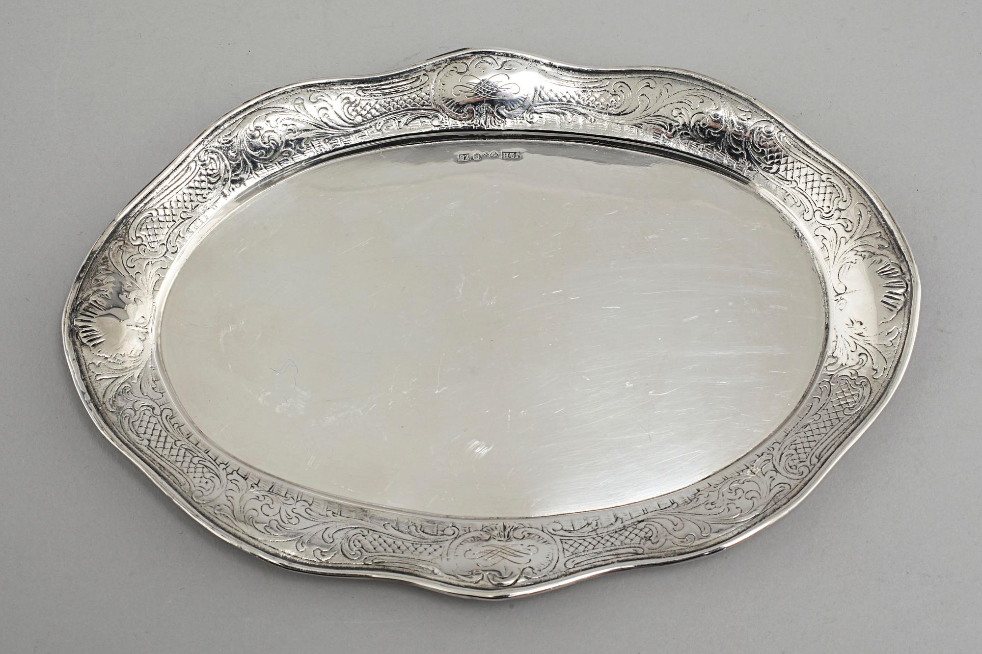 A silver sugarbowl, a cream jug and a tray by J L Hultman, Stockholm, mid 20th century.