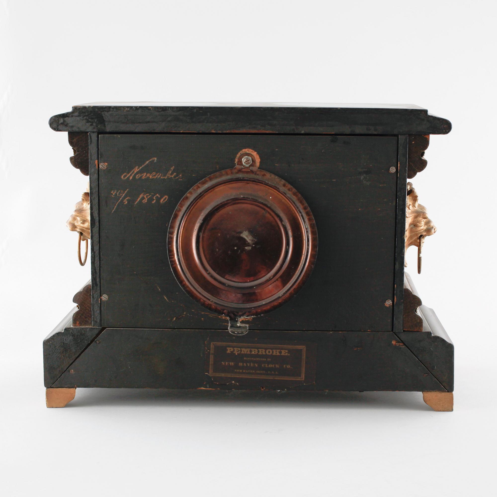 A 19th century table clock by New Haven Clock Co in New Haven, USA.