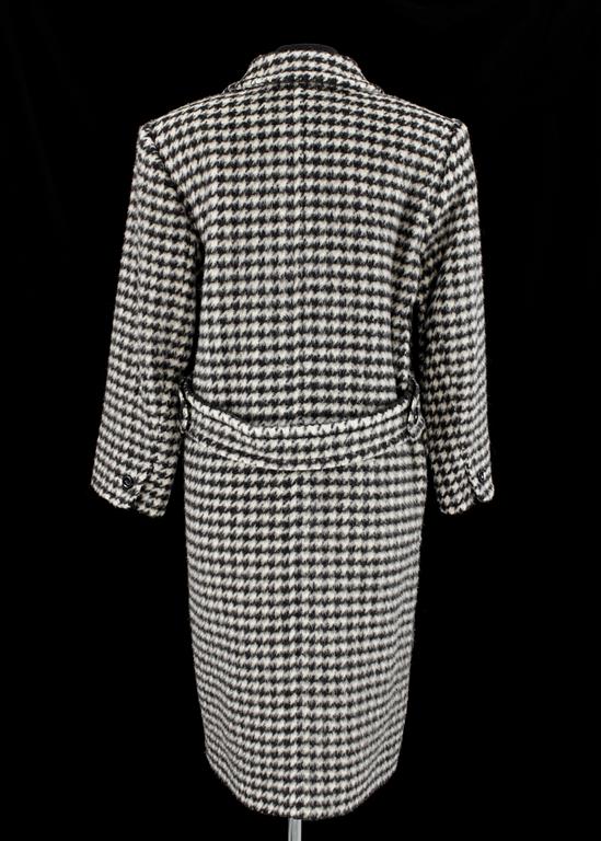 A 1984s coat by Yves Saint Laurent.