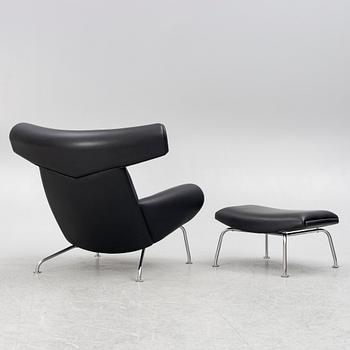 Hans J. Wegner, fåtölj med fotpall, "Ox Chair", EJ-100, Erik Jørgensen Møbelfabrik A/S, Svendborg, Danmark.