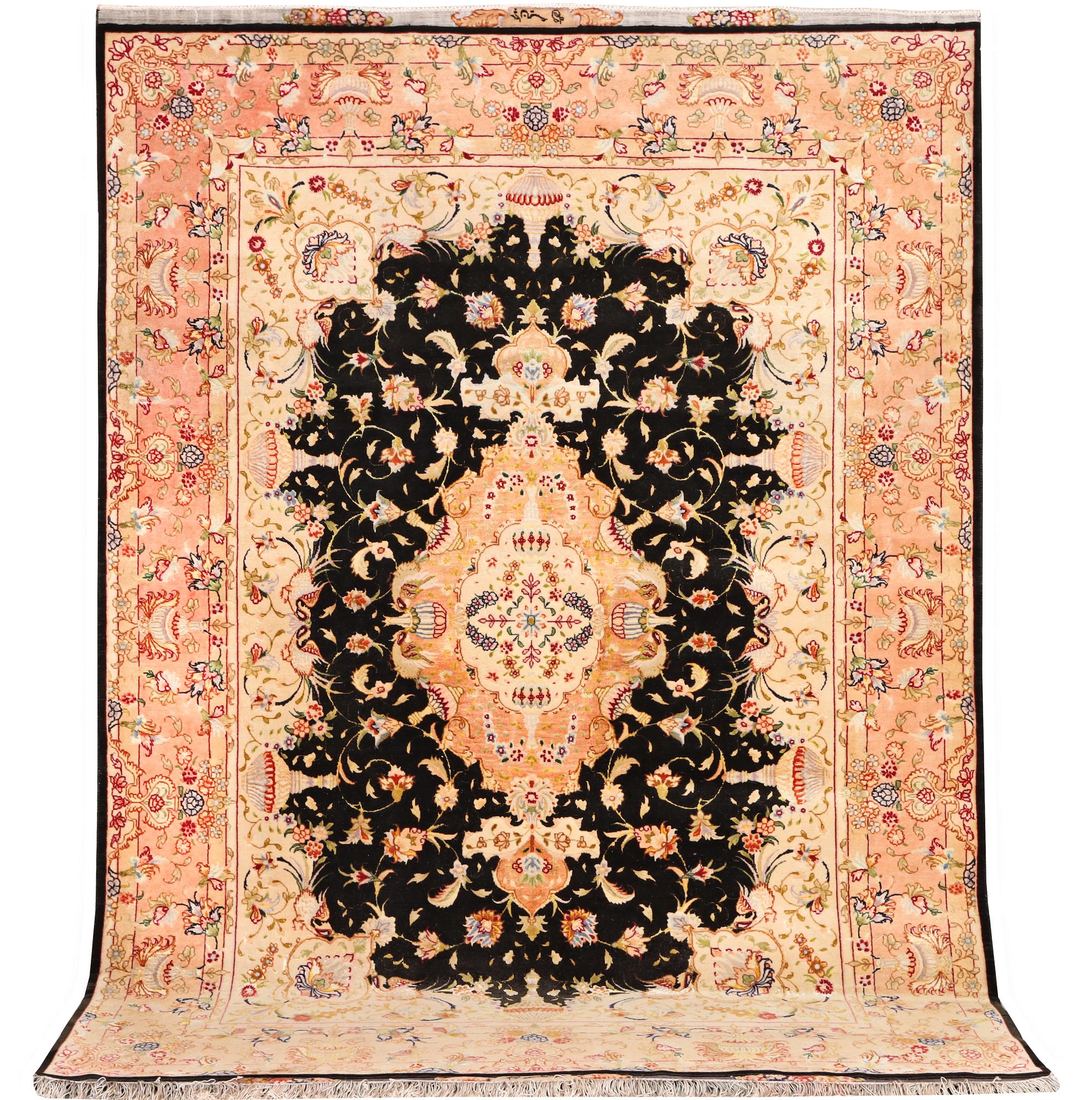 A Tabriz rug, a. 210 x 147 cm.