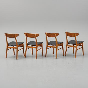 A teak dining table with 4 'Monaco' chairs, mid 20th century.