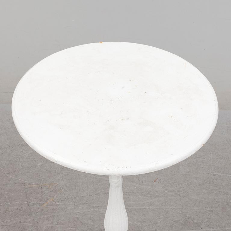 an early 20th century cast iron table.