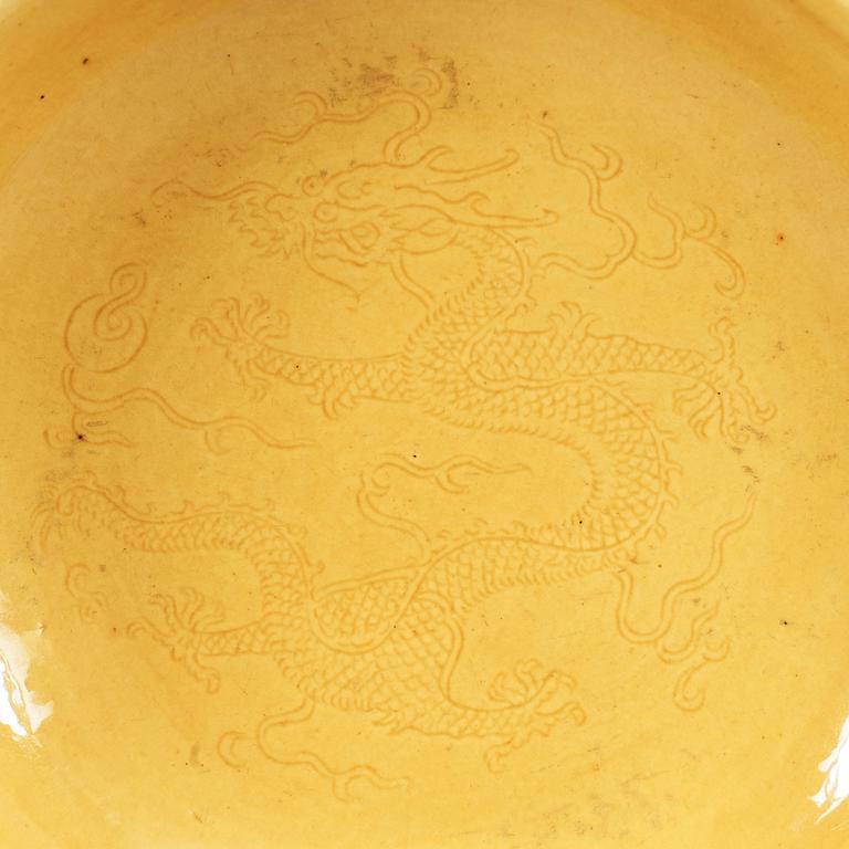 A Yellow glazed dish, Qing dynasty, with Daoguang seal mark and period (1821-1850).