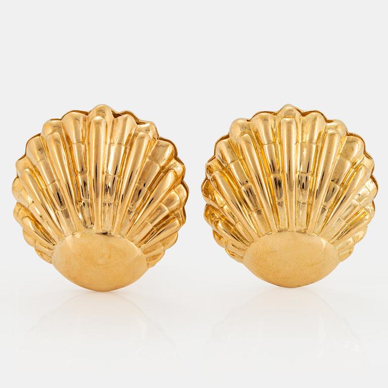 A pair of 18K gold earrings.