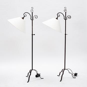 Harald Notini, a pair of wrought iron floor lamps, model '15101', Arvid Böhlmarks Lampfabrik, 1930's.