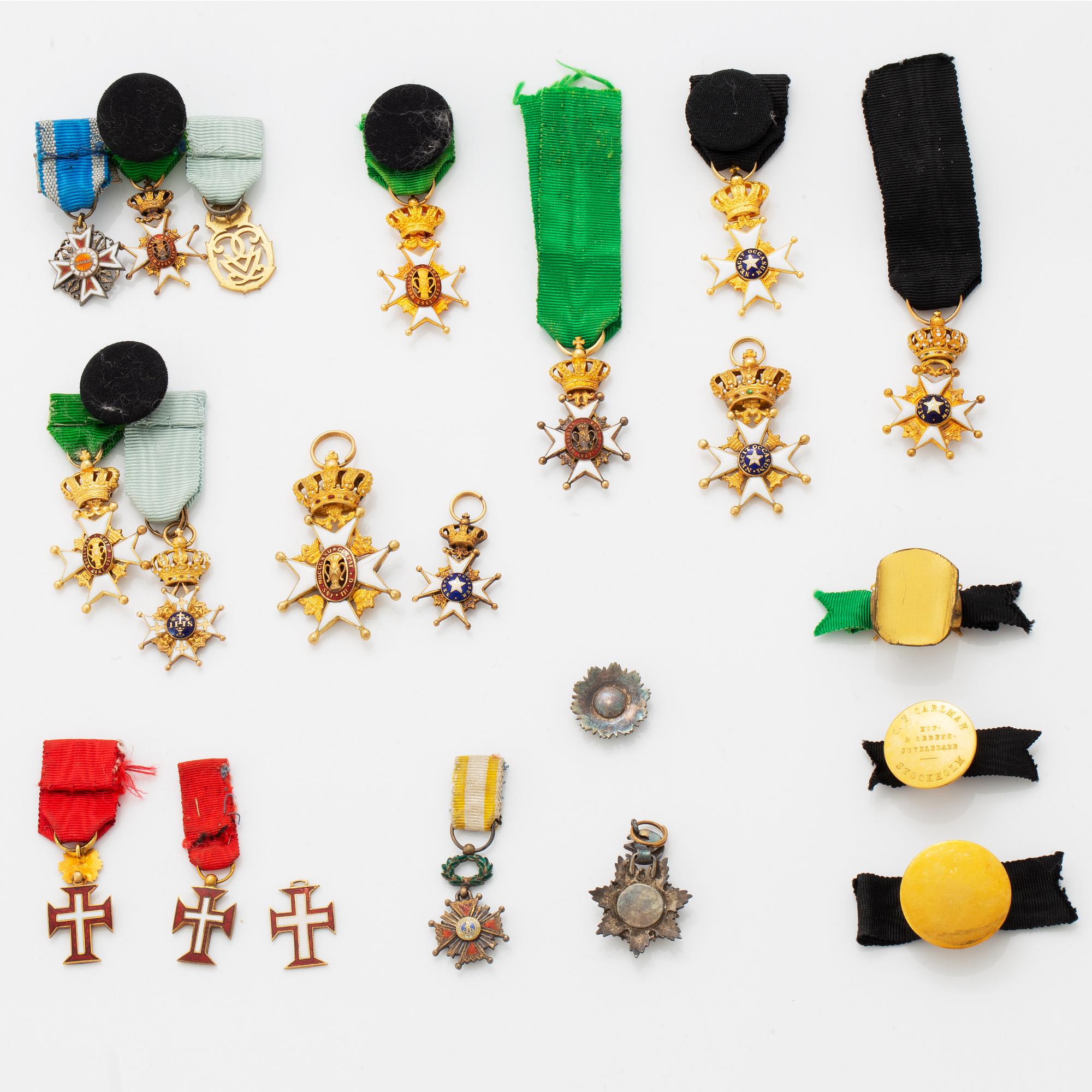 A group of miniature decorations, mostly Swedish.