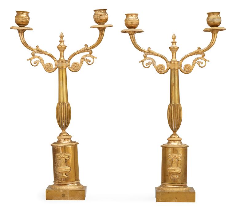 A pair of Swedish Empire early 19th century two-light candelabra.