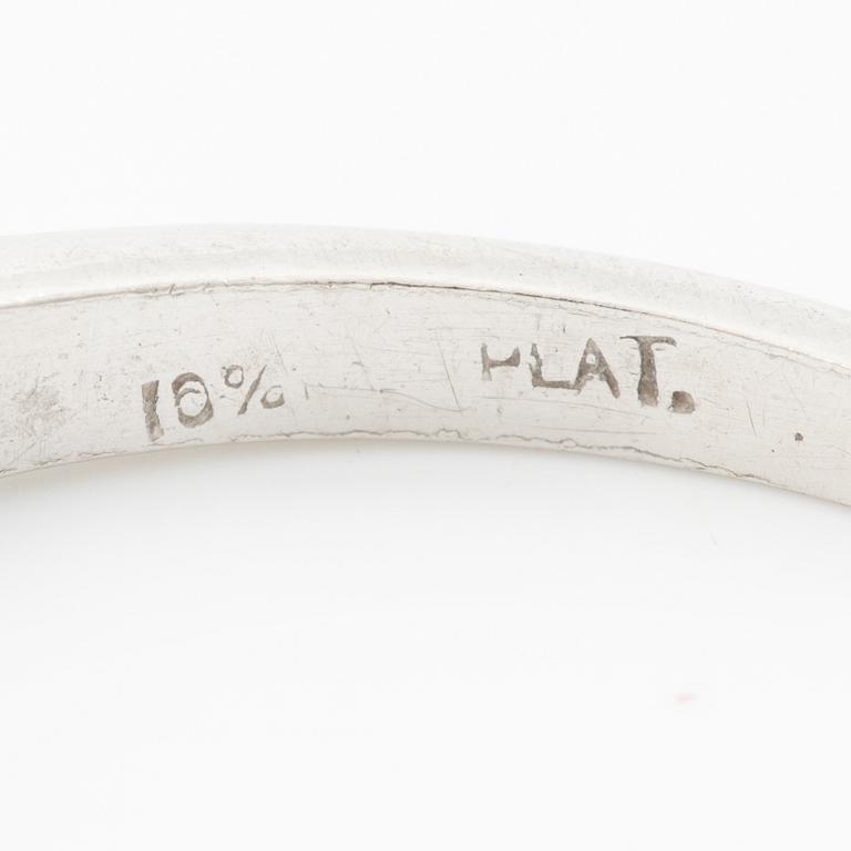 Platinum ring with baguette-cut diamonds.