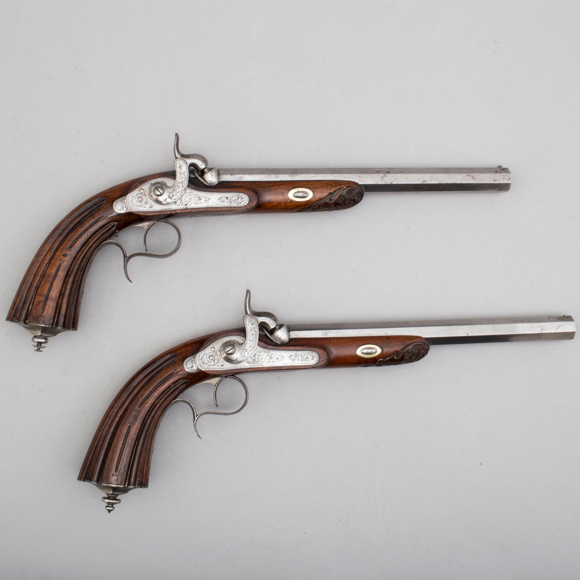 A mid 19th century pair of percussion pistols.