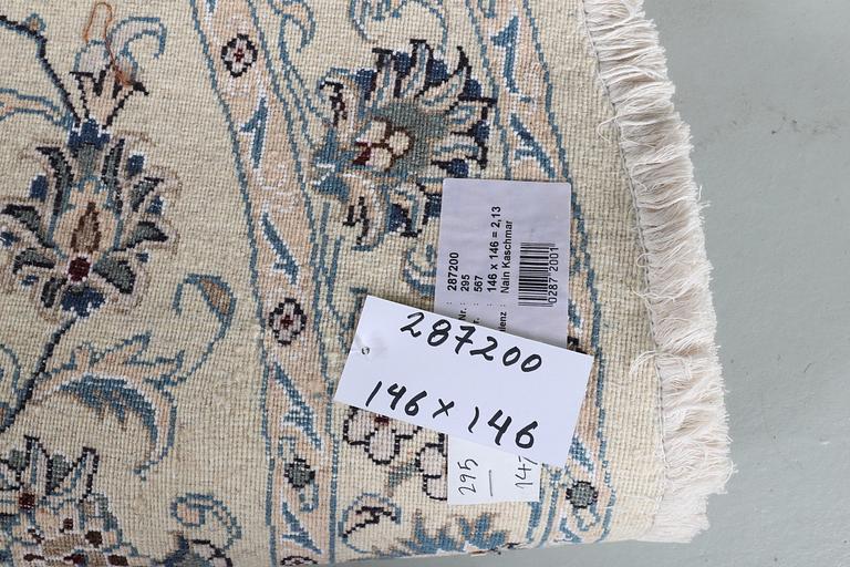 A rug, Nain, part silk, ca 146 x 146 cm.